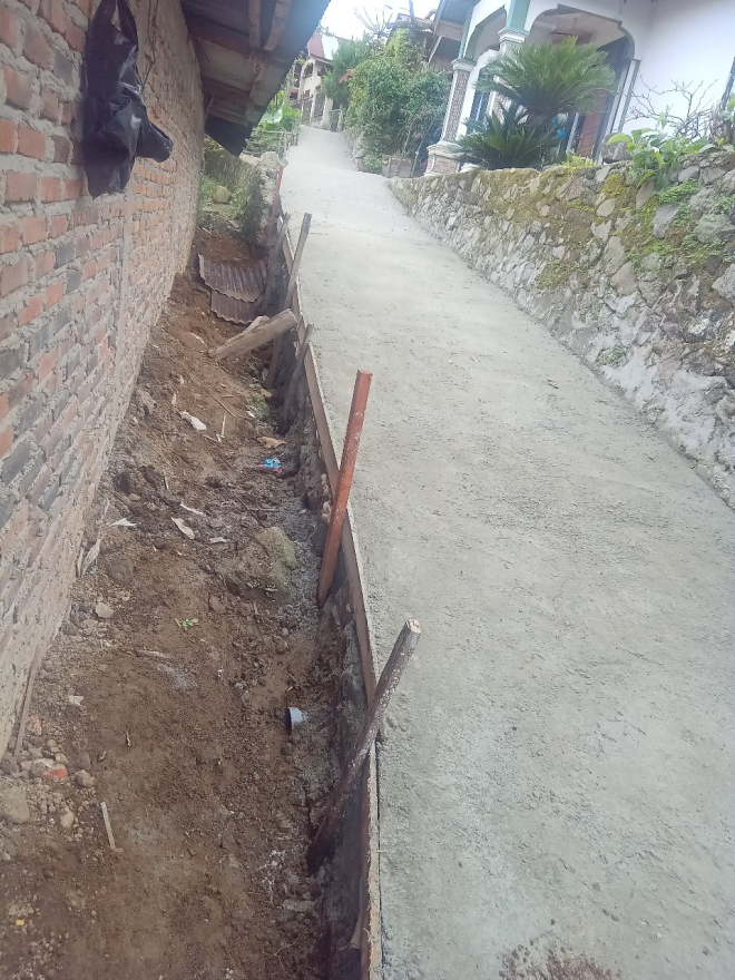 SEMANGAT MEMBANGUN PEMERINTAH DESA LOLO HILIR BUKTI NYATA KEPALA DESA LOLO HILIR DALAM PEMBAGUNAN SALAH SATU NYA  PEMBANGUNAN JALAN LINGKUNGAN TAHUN 2025